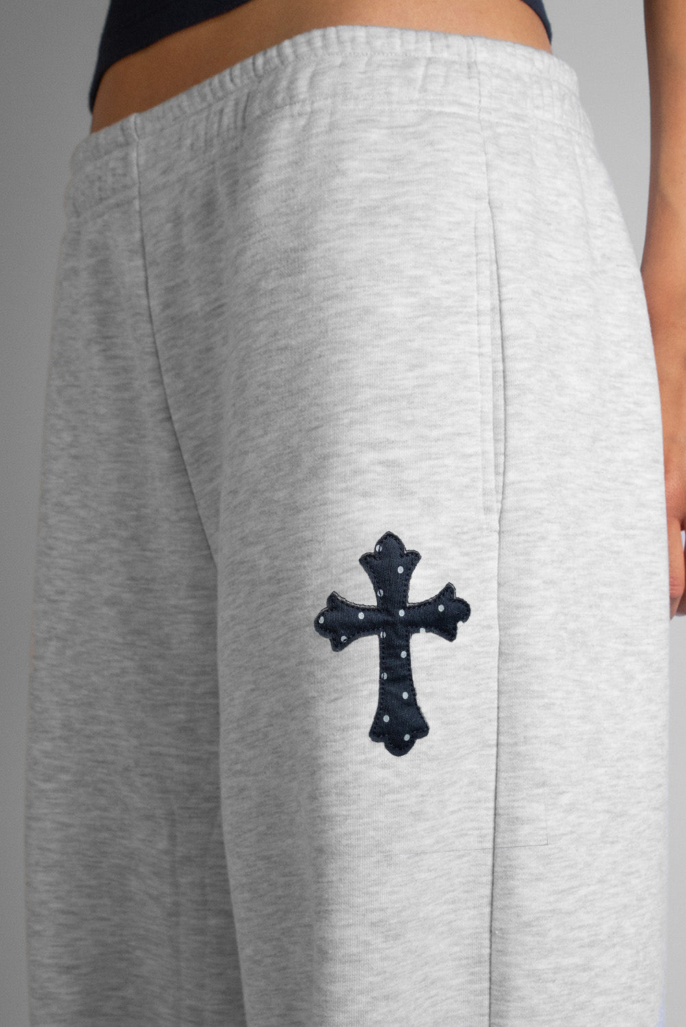 Wide-leg joggers with cross patch | Subdued
