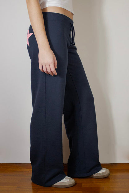 Wide-leg joggers with stars | Subdued