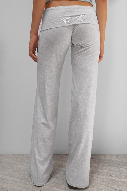 Cuffed pants with wings | Subdued