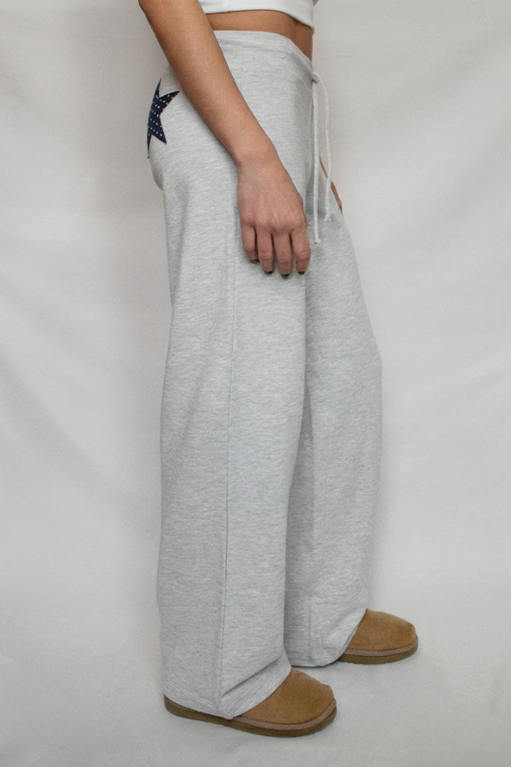 Wide-leg joggers with stars patch | Subdued