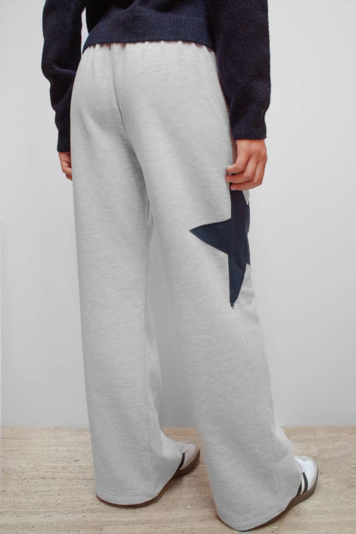 Wide-leg joggers with star | Subdued