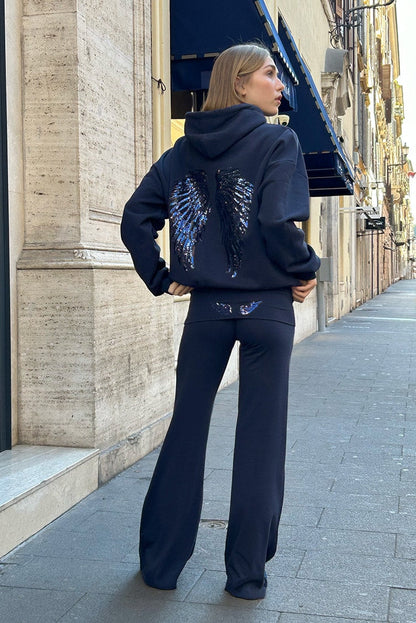 Cuffed pants with wings | Subdued