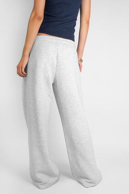 Wide-leg joggers with cross patch | Subdued