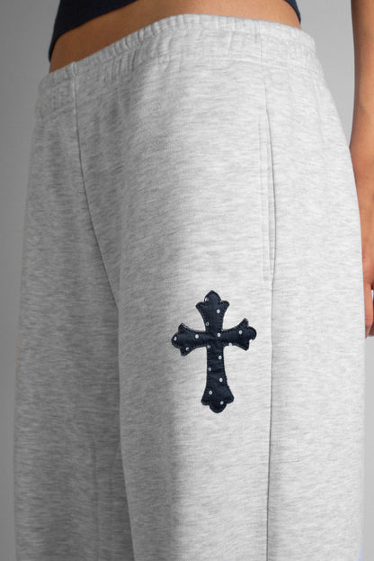 Wide-leg joggers with cross patch | Subdued