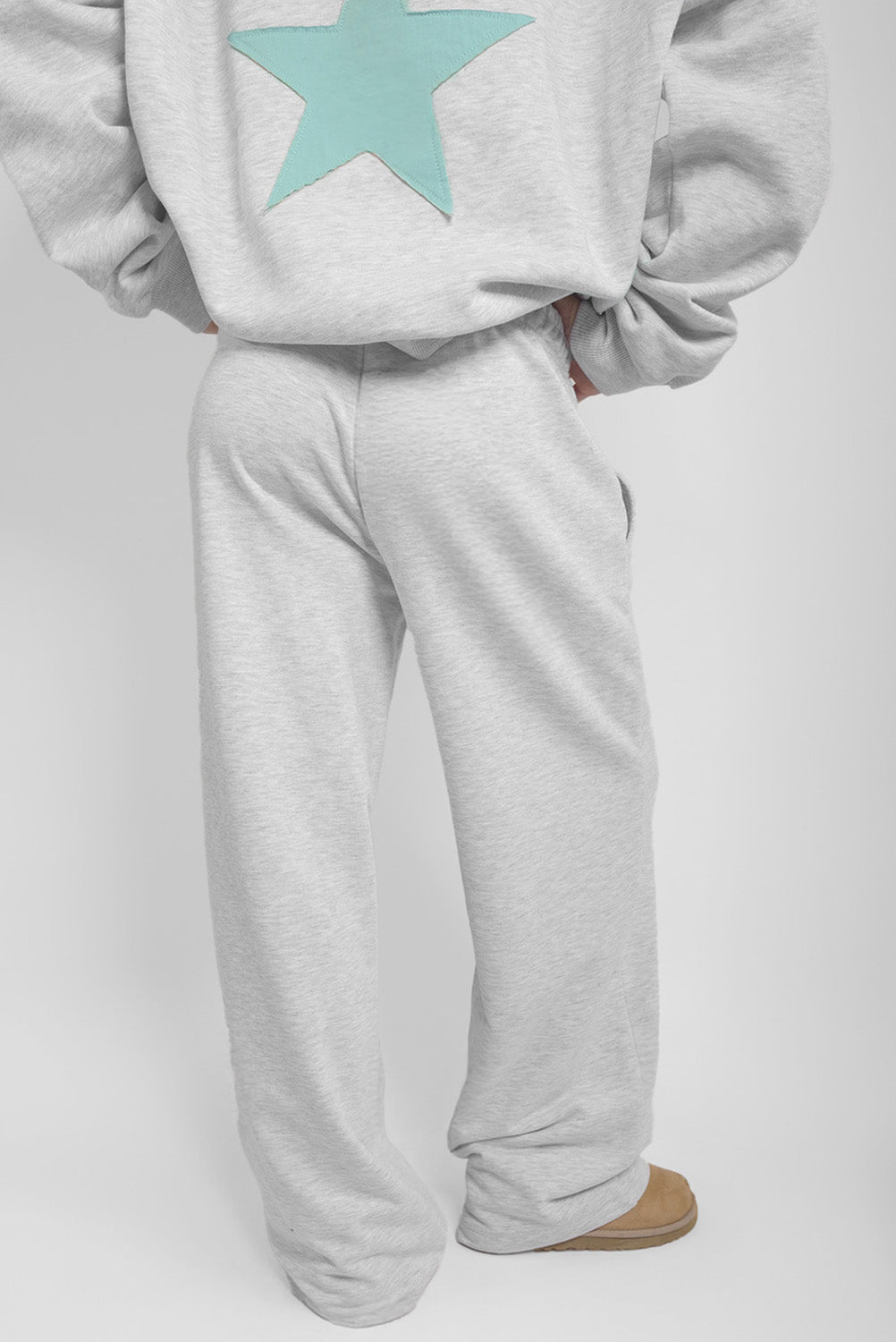 Wide-leg joggers with star patch | Subdued